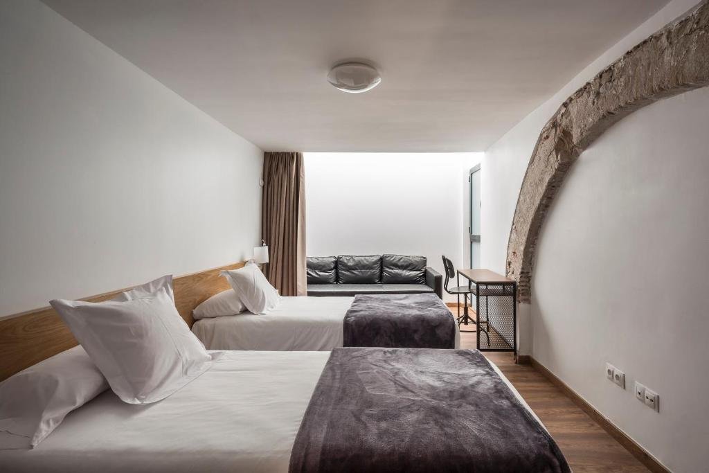 Camas organizadas para una estancia perfecta.